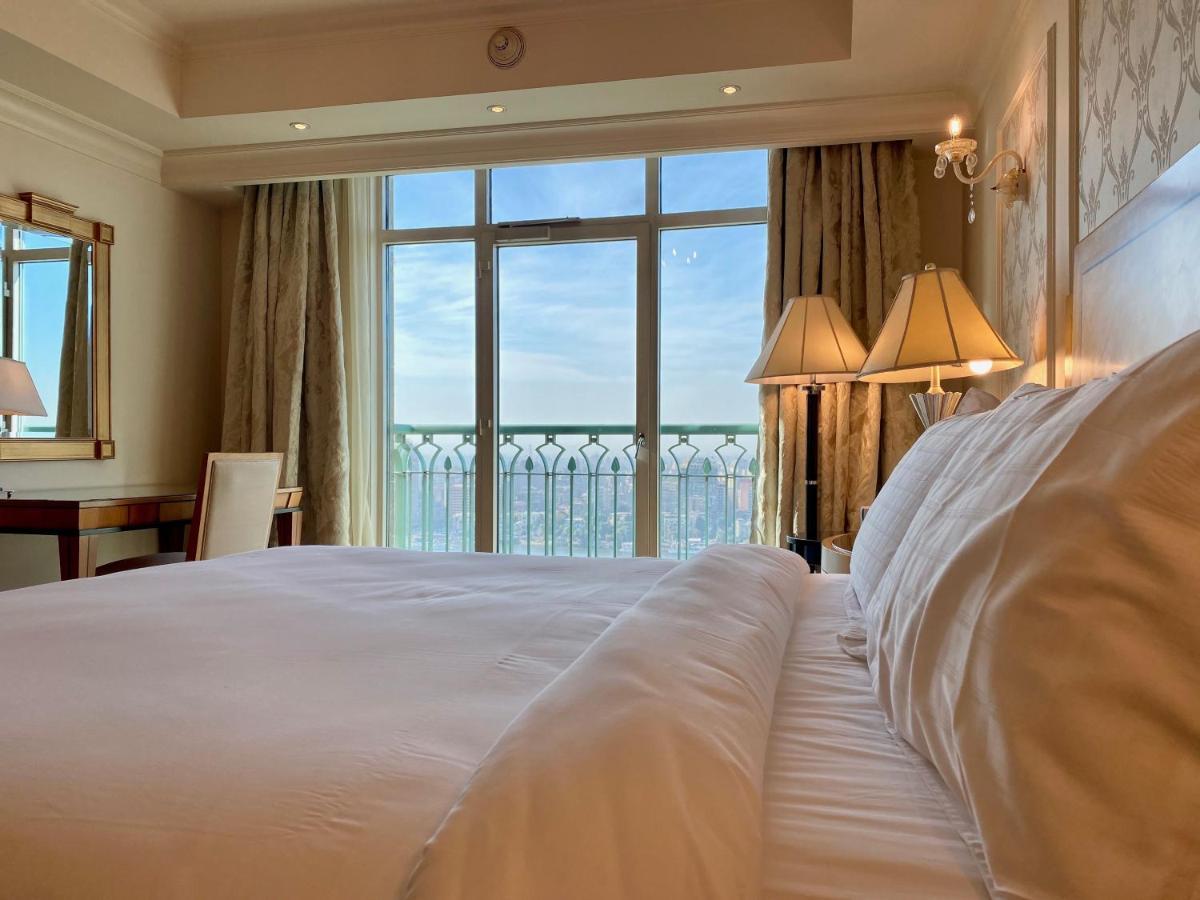 Chez Haytham At Four Seasons Nile Plaza Residential Suite Каир Экстерьер фото