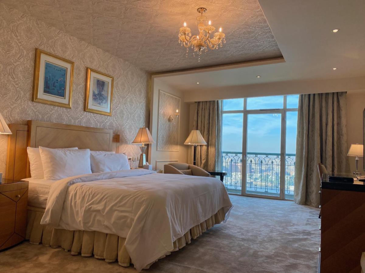 Chez Haytham At Four Seasons Nile Plaza Residential Suite Каир Экстерьер фото
